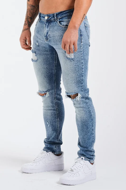 American Style SLIM FIT JEANS 2.0 RIPPED AND REPAIRED - MID BLUE